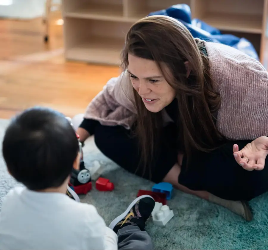 Speech therapist speaking with a parent
