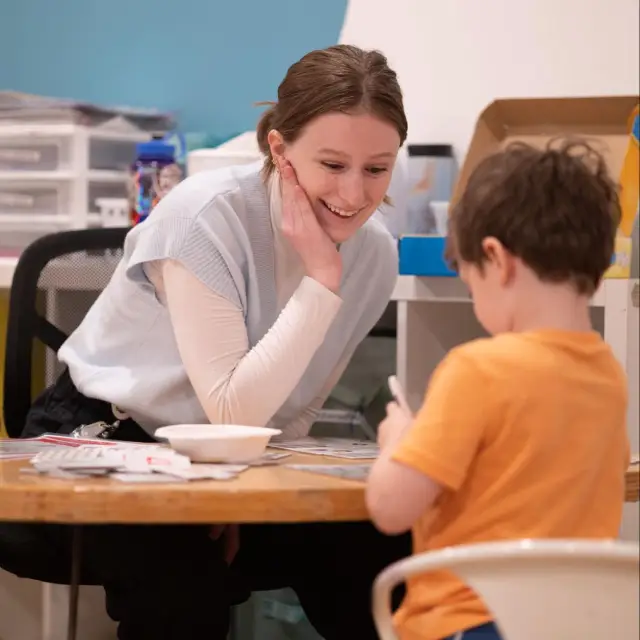 A CST Academy clinician meeting with a parent and child